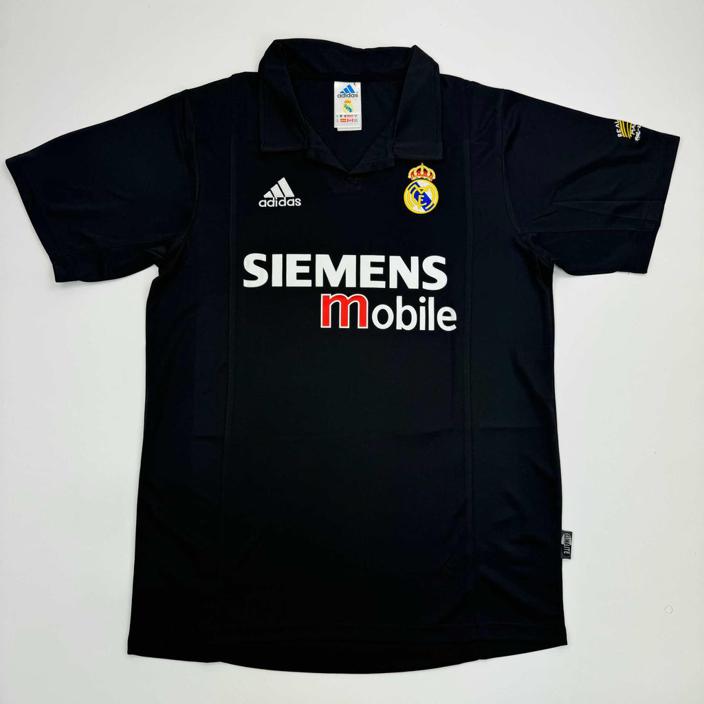 autographed-signed-ronaldo-nazario-real-madrid-black-soccer-jersey-beckett-bas-coa