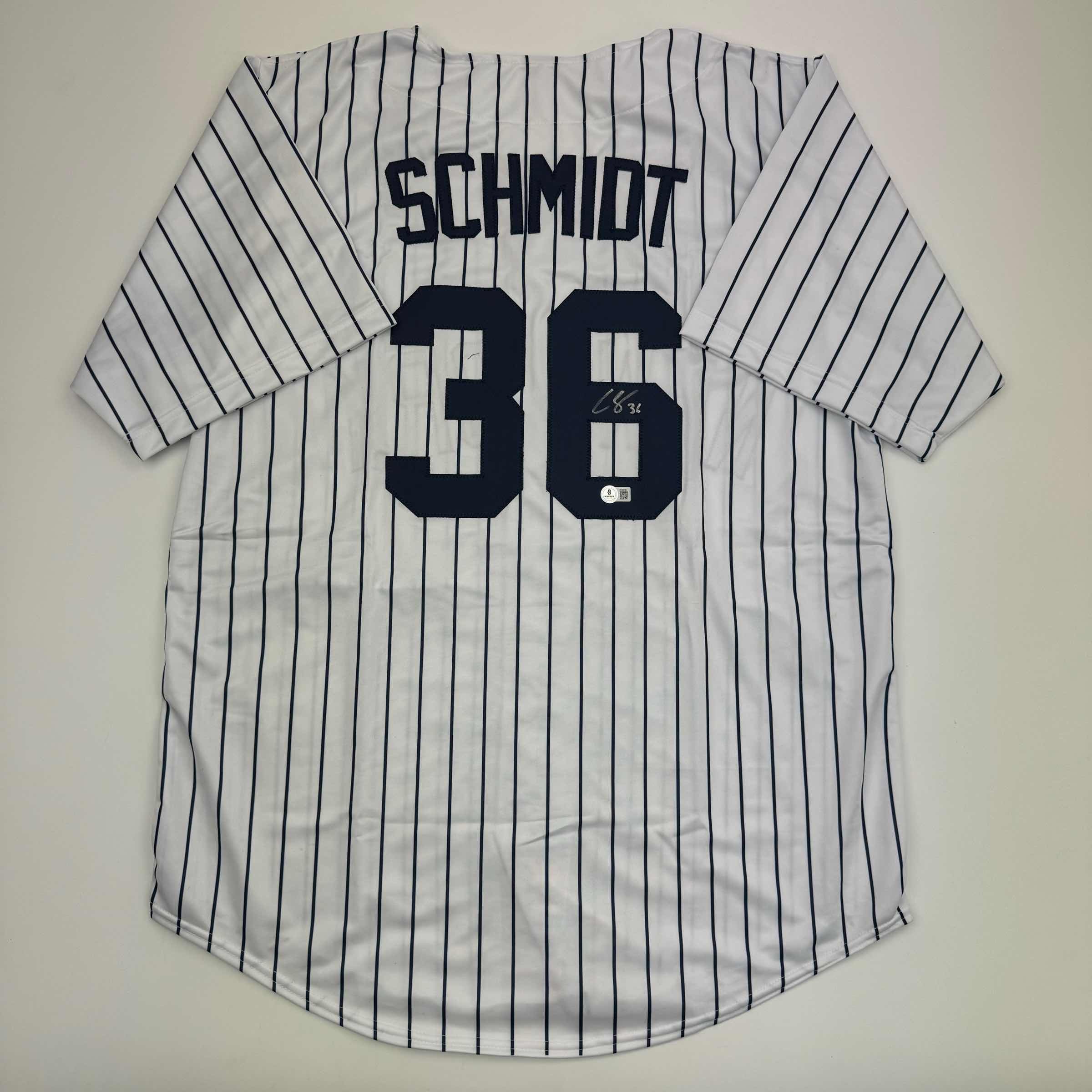 autographed-signed-clarke-schmidt-new-york-pinstripe-baseball-jersey-beckett-bas-coa