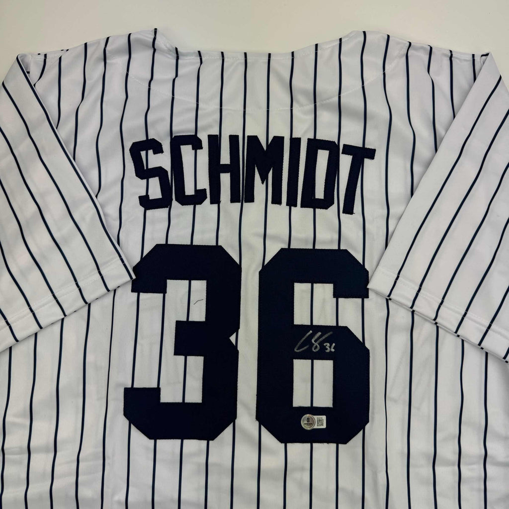autographed-signed-clarke-schmidt-new-york-pinstripe-baseball-jersey-beckett-bas-coa