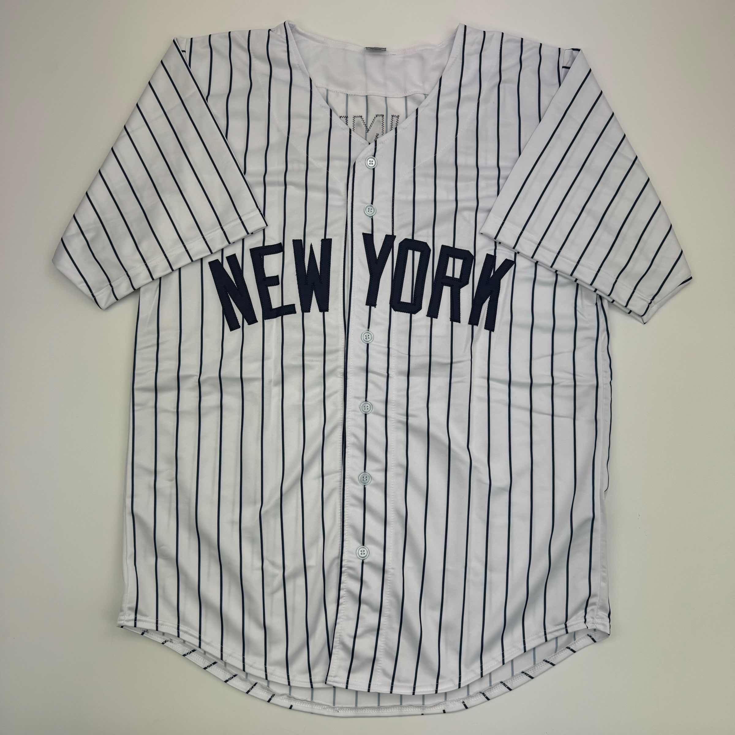 autographed-signed-clarke-schmidt-new-york-pinstripe-baseball-jersey-beckett-bas-coa