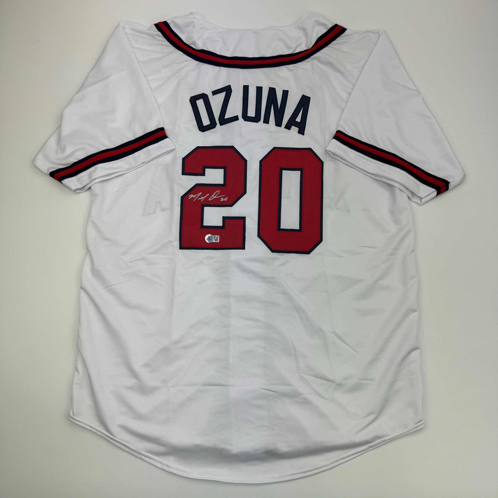 autographed-signed-marcell-ozuna-atlanta-white-baseball-jersey-beckett-bas-coa