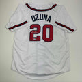autographed-signed-marcell-ozuna-atlanta-white-baseball-jersey-beckett-bas-coa