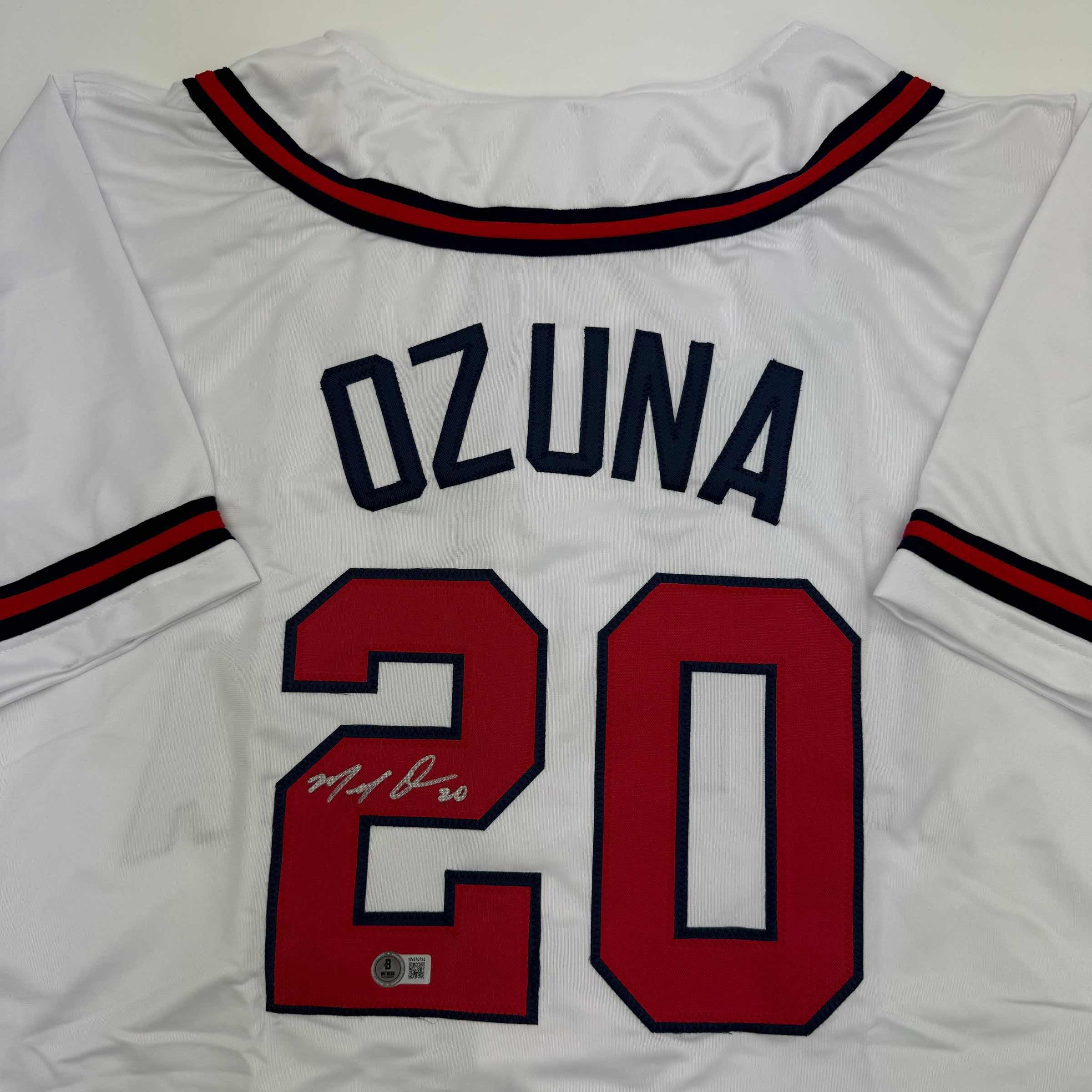 autographed-signed-marcell-ozuna-atlanta-white-baseball-jersey-beckett-bas-coa
