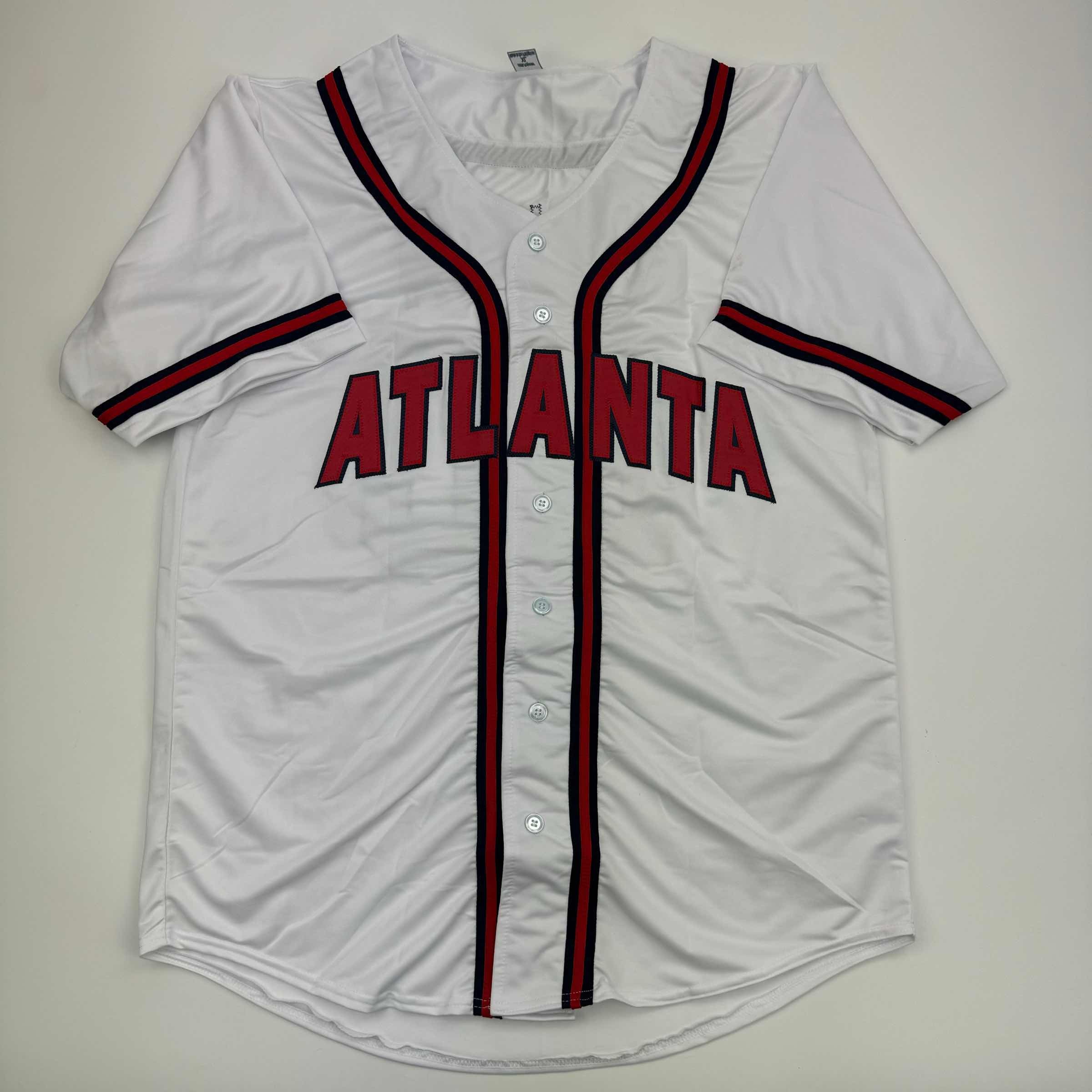 autographed-signed-marcell-ozuna-atlanta-white-baseball-jersey-beckett-bas-coa