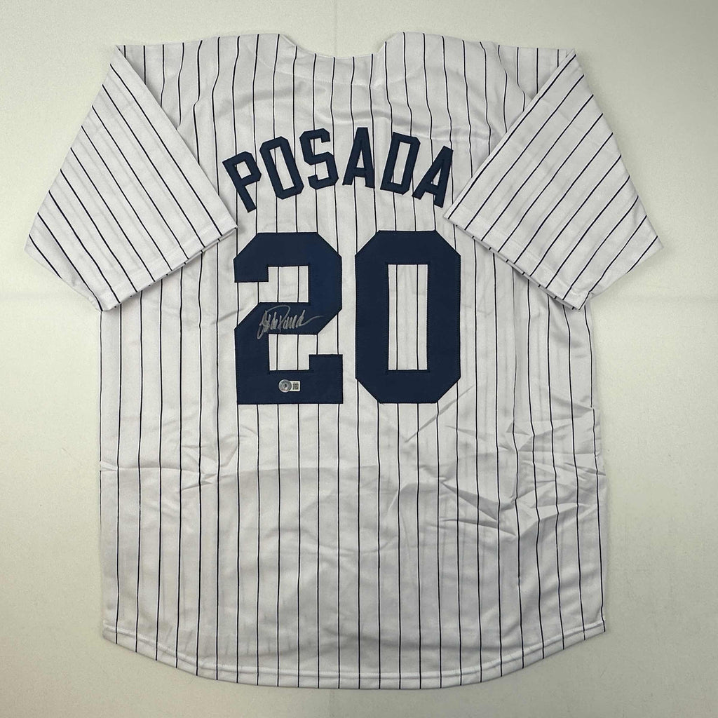 autographed-signed-jorge-posada-new-york-pinstripe-baseball-jersey-beckett-bas-coa