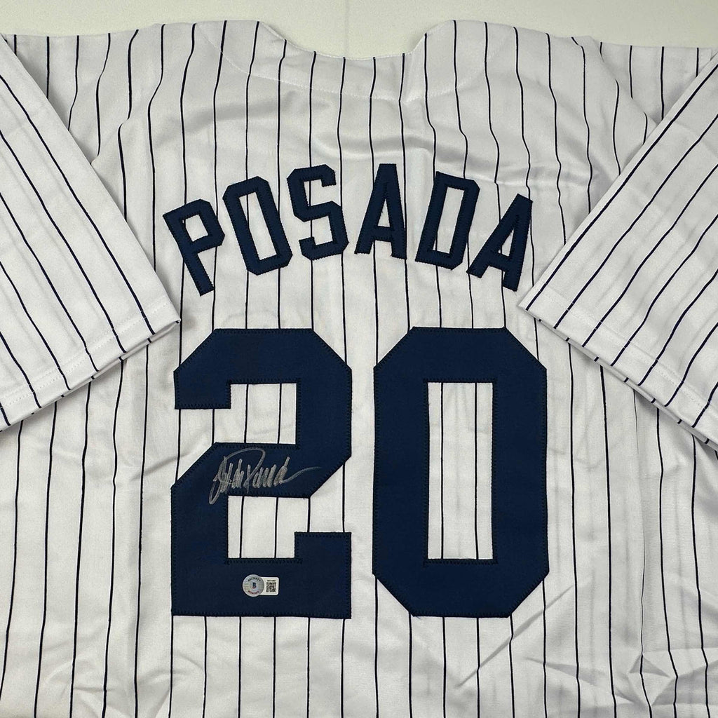 autographed-signed-jorge-posada-new-york-pinstripe-baseball-jersey-beckett-bas-coa