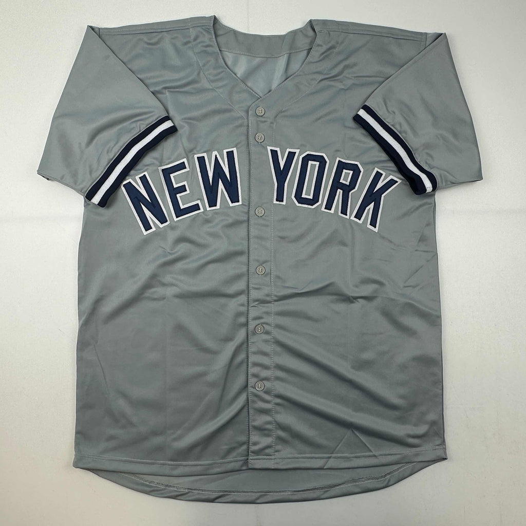 autographed-signed-jorge-posada-new-york-grey-baseball-jersey-beckett-bas-coa
