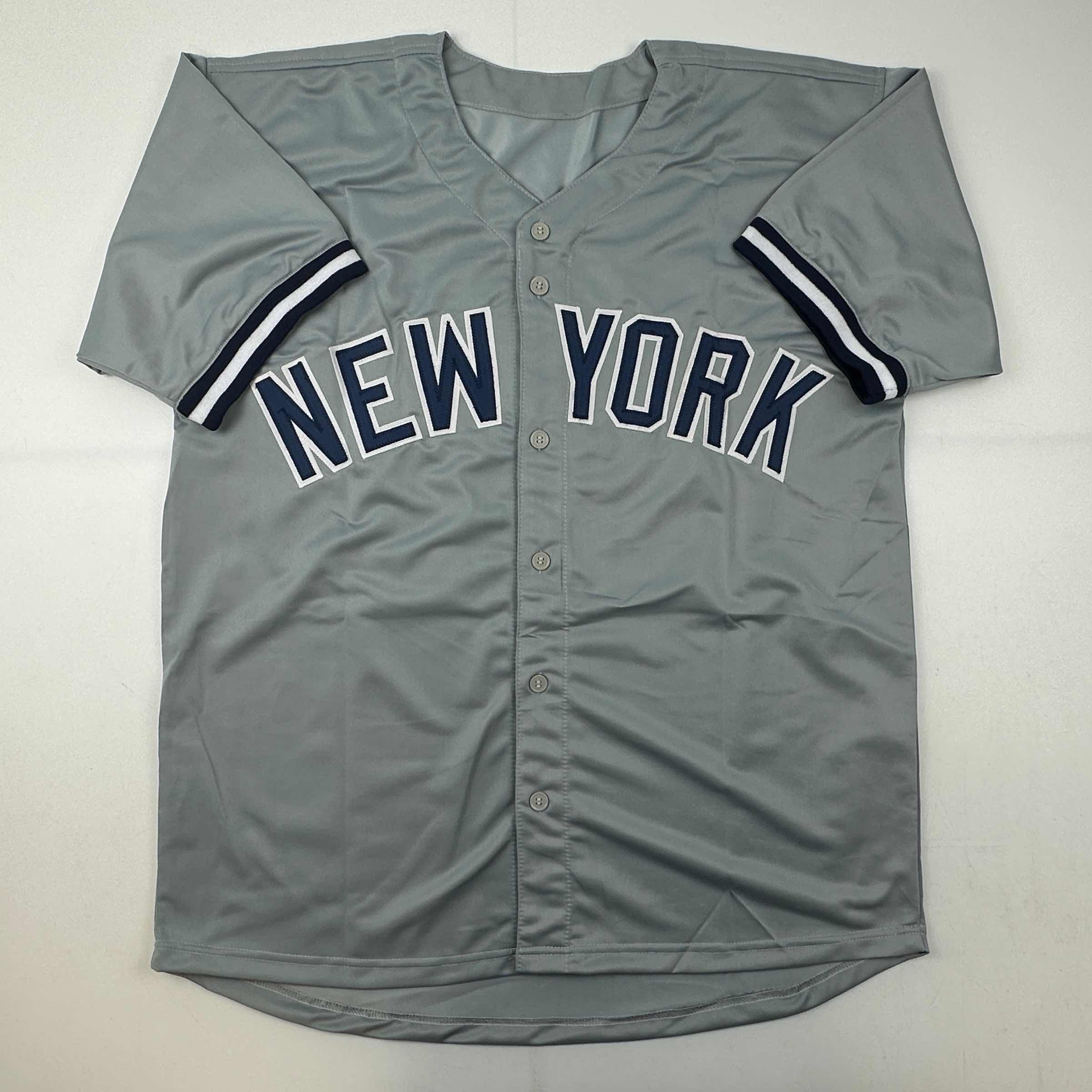 autographed-signed-jorge-posada-new-york-grey-baseball-jersey-beckett-bas-coa