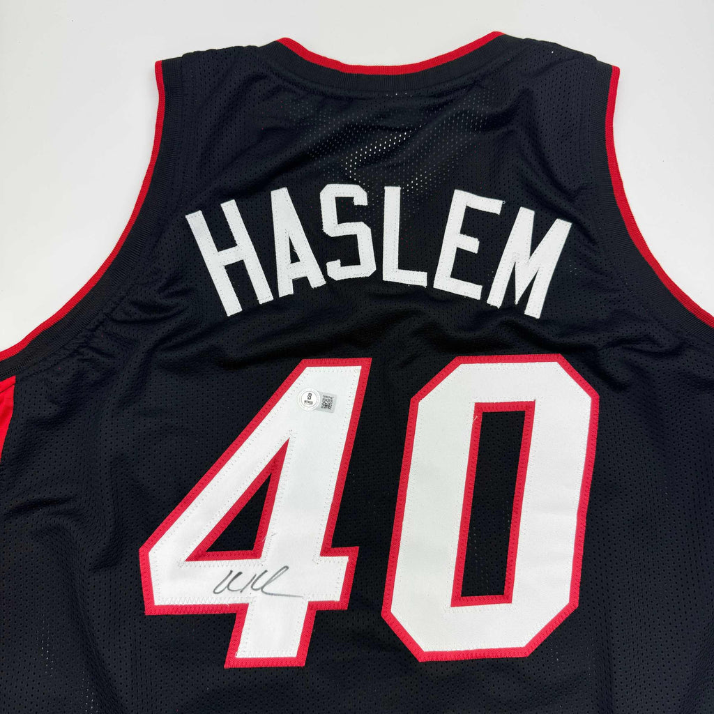 autographed-signed-udonis-haslem-miami-black-basketball-jersey-beckett-bas-coa
