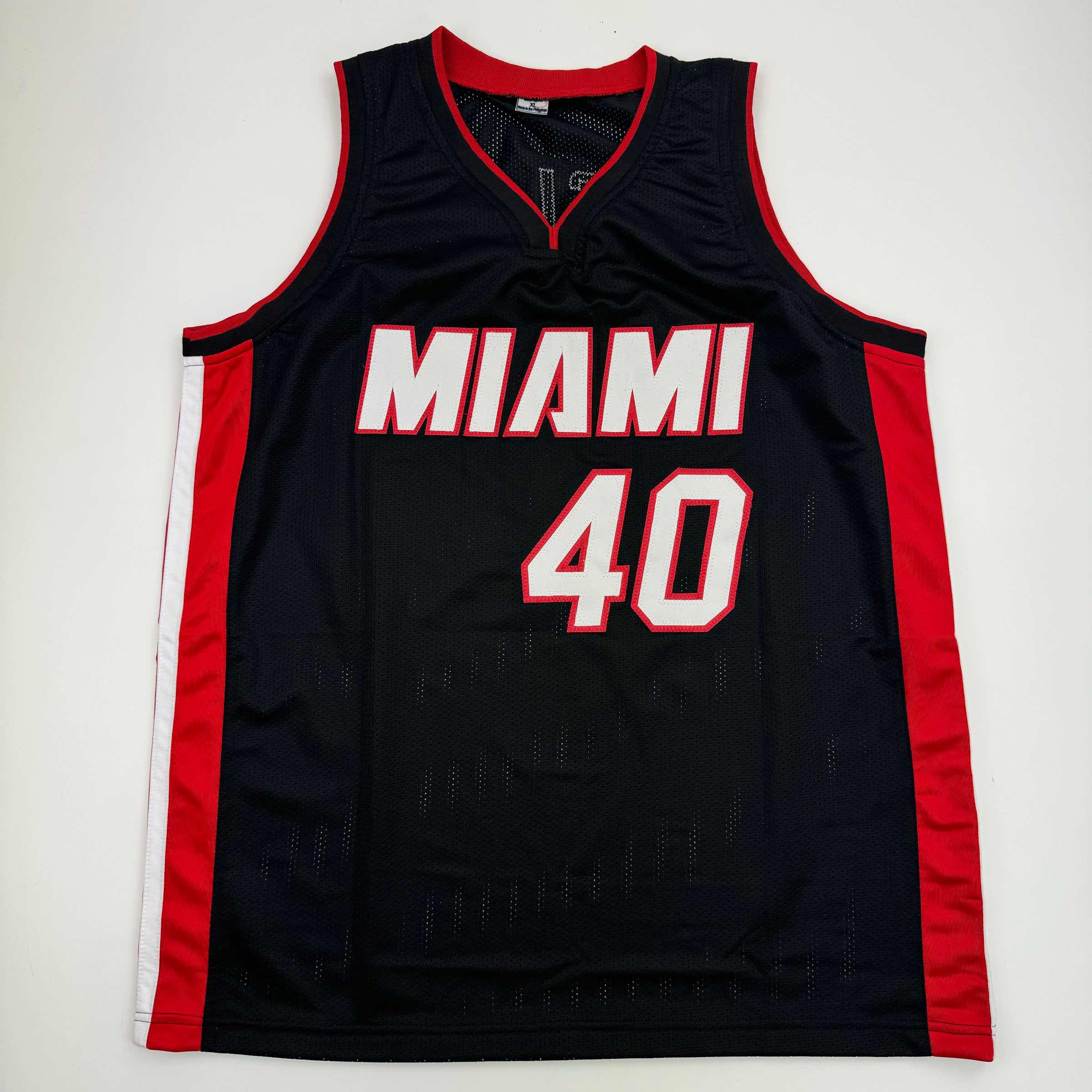 autographed-signed-udonis-haslem-miami-black-basketball-jersey-beckett-bas-coa