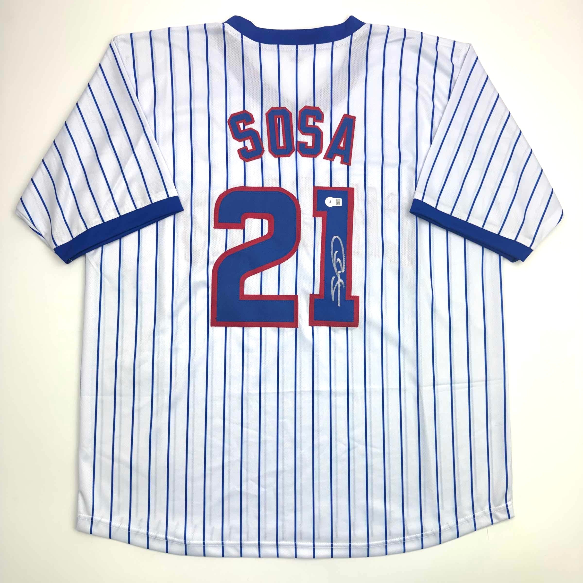 autographed-signed-sammy-sosa-chicago-pinstripe-baseball-jersey-beckett-bas-coa