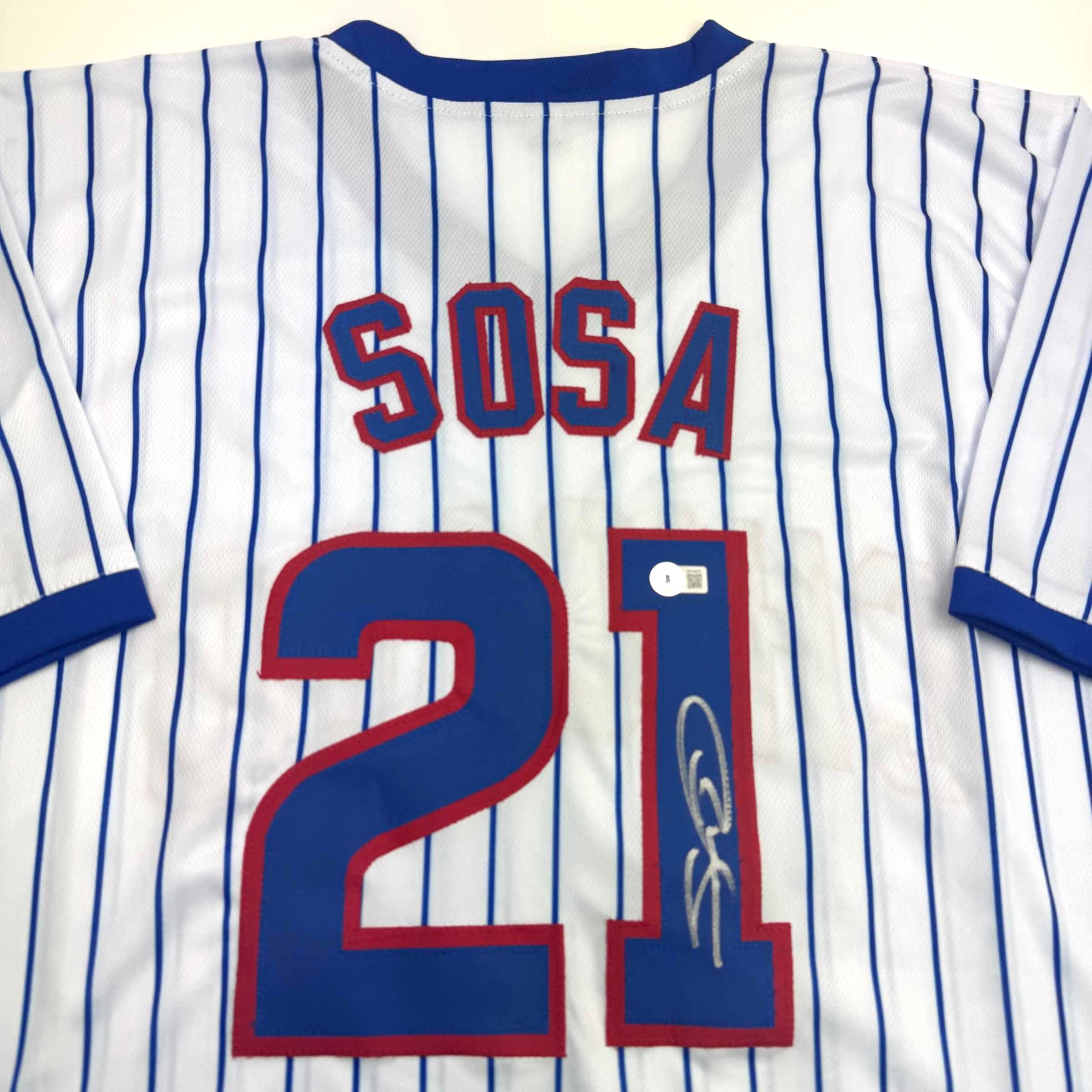 autographed-signed-sammy-sosa-chicago-pinstripe-baseball-jersey-beckett-bas-coa