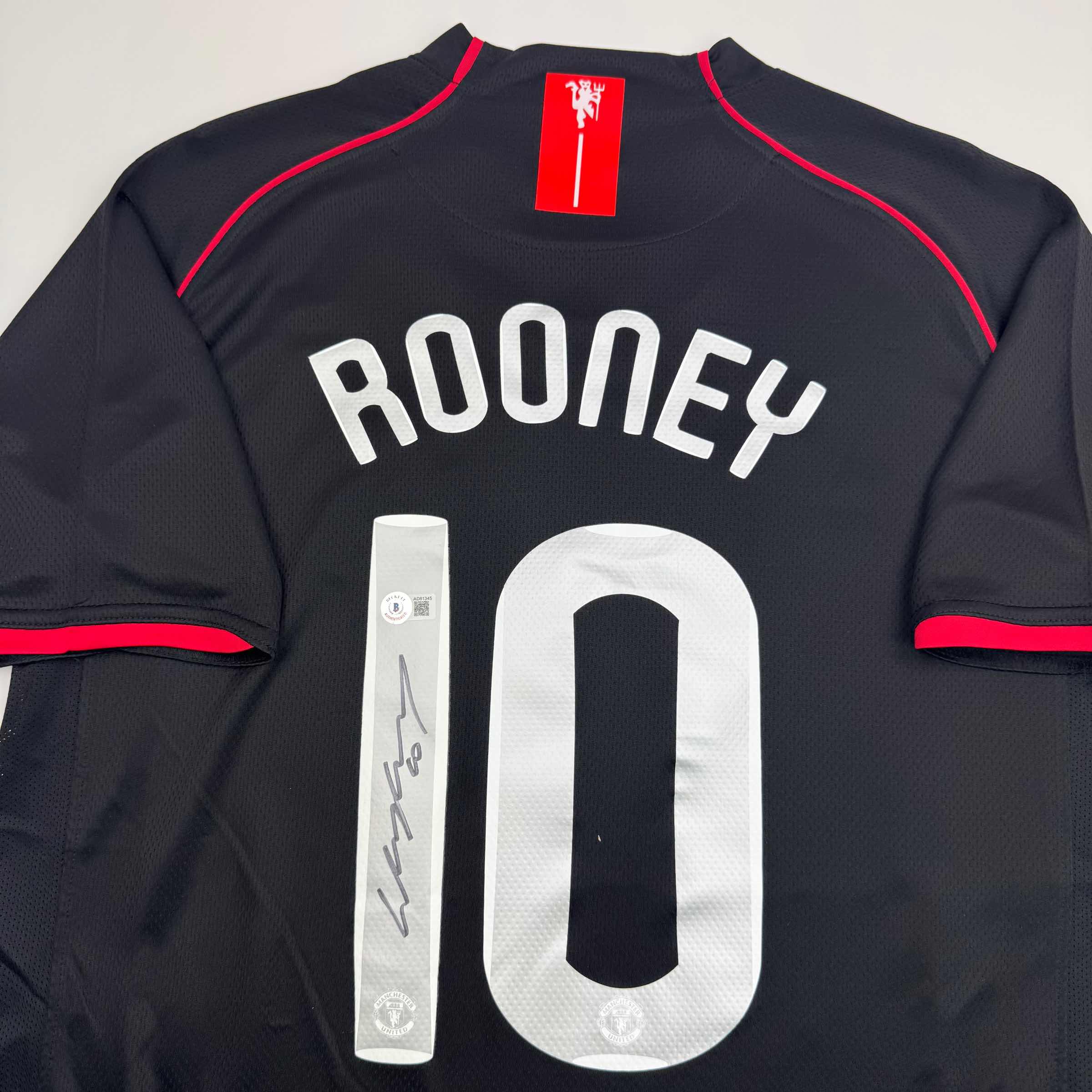 autographed-signed-wayne-rooney-manchester-united-black-2008-champions-league-final-soccer-jersey-beckett-bas-coa