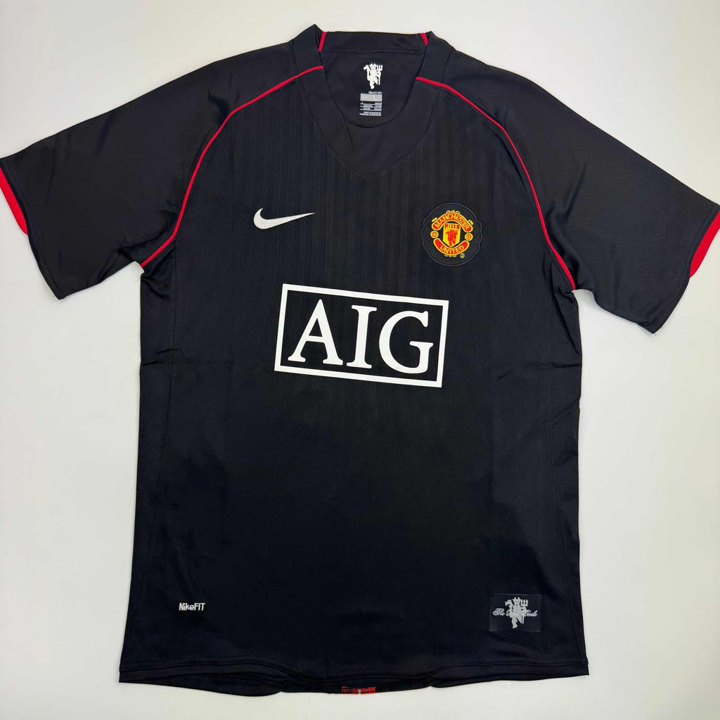 autographed-signed-wayne-rooney-manchester-united-black-2008-champions-league-final-soccer-jersey-beckett-bas-coa