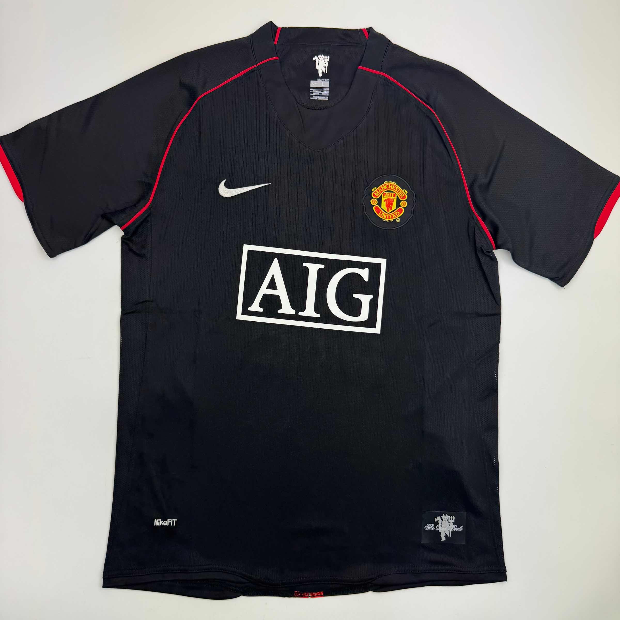 autographed-signed-wayne-rooney-manchester-united-black-2008-champions-league-final-soccer-jersey-beckett-bas-coa