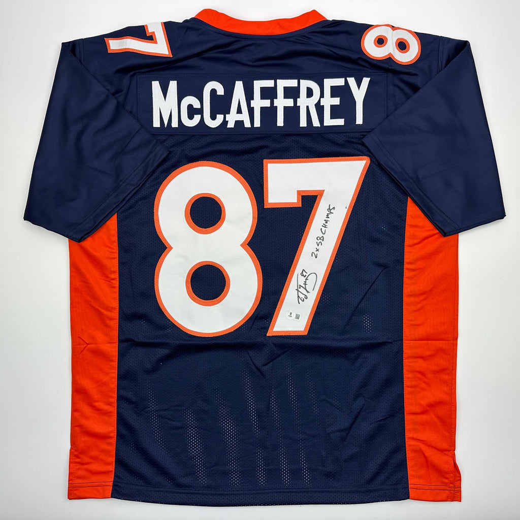 autographed-signed-ed-mccaffrey-2x-sb-champs-denver-blue-football-jersey-beckett-bas-coa