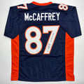 autographed-signed-ed-mccaffrey-2x-sb-champs-denver-blue-football-jersey-beckett-bas-coa