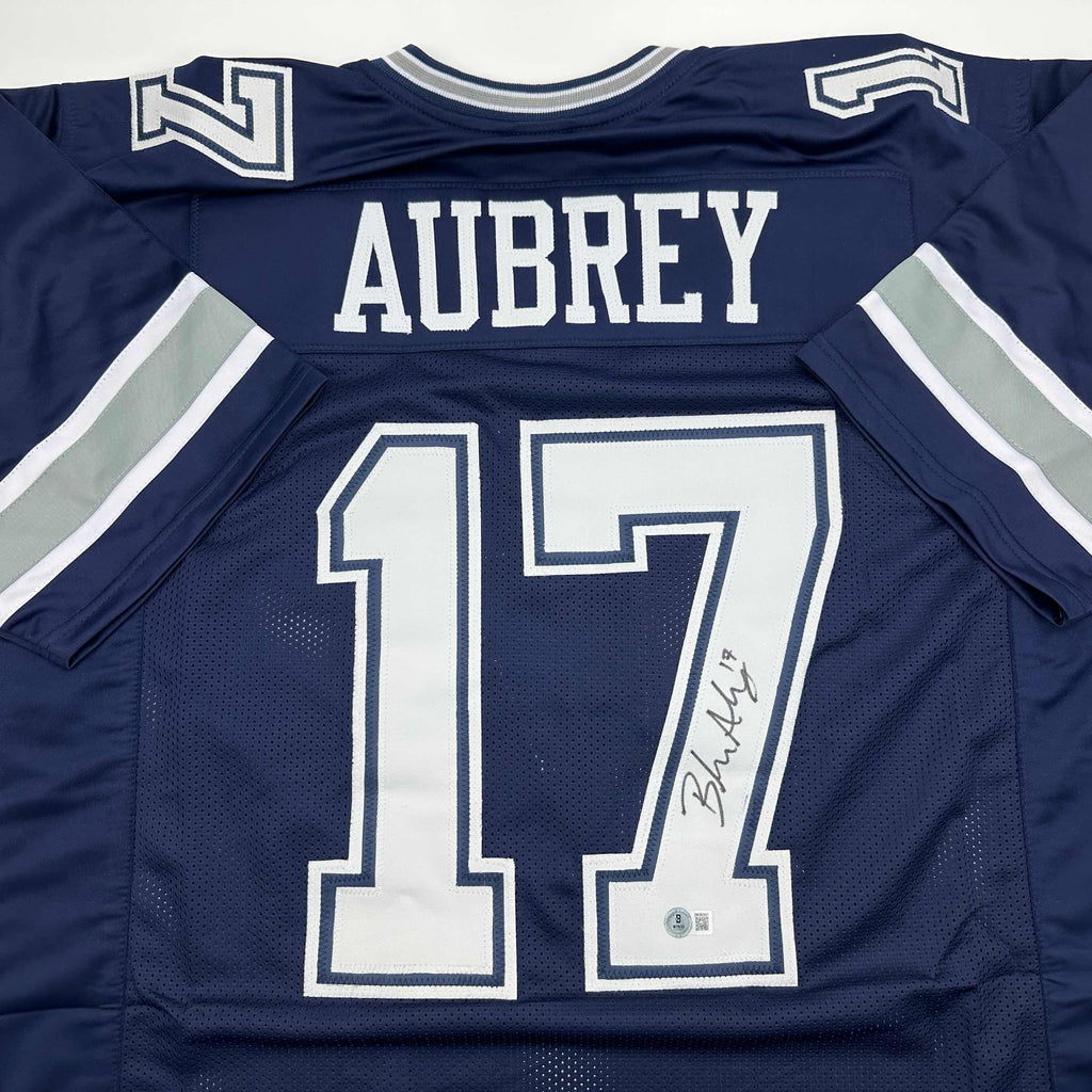 autographed-signed-brandon-aubrey-dallas-blue-football-jersey-beckett-bas-coa