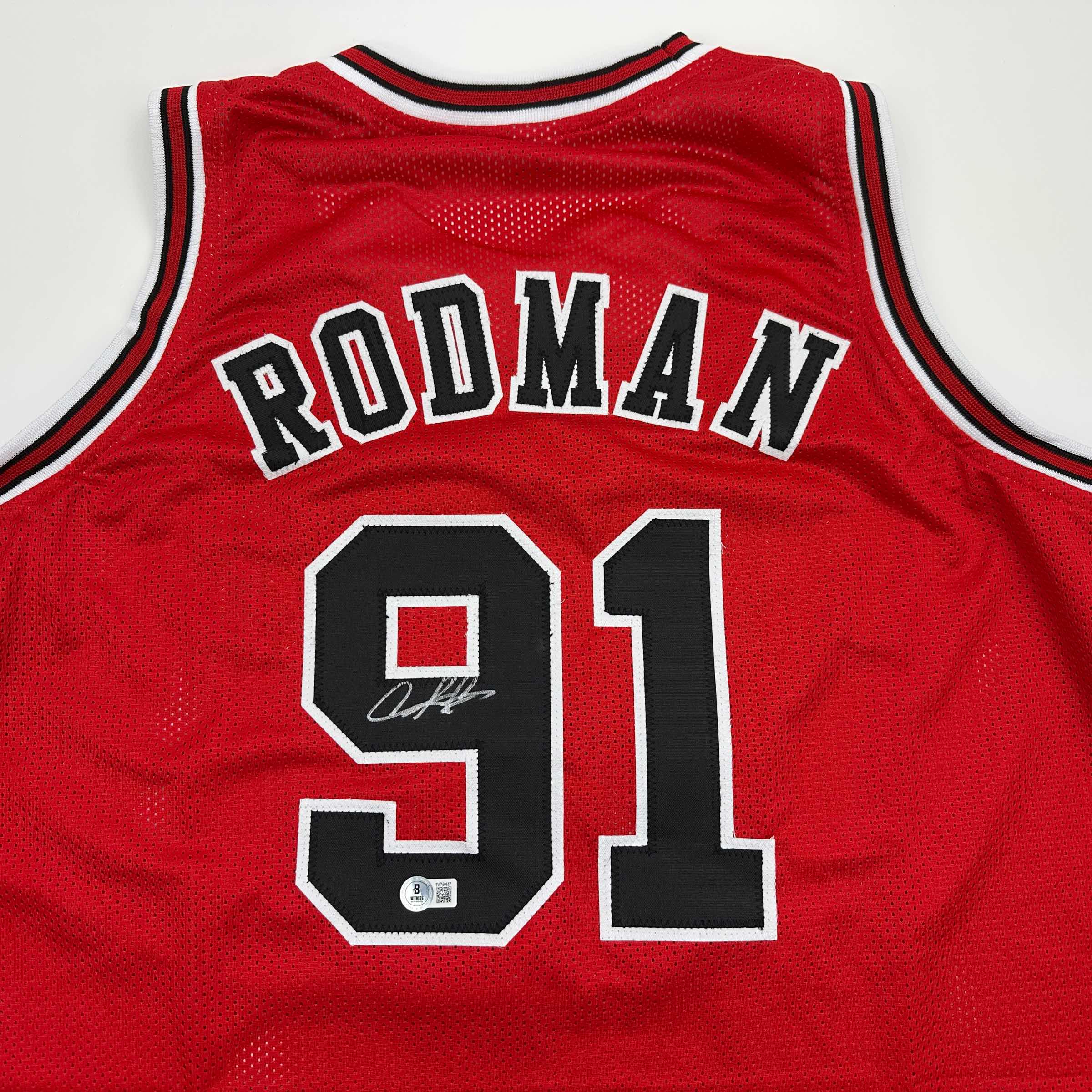 autographed-signed-dennis-rodman-chicago-red-basketball-jersey-beckett-bas-coa