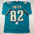 autographed-signed-jimmy-smith-jacksonville-teal-football-jersey-psa-dna-coa