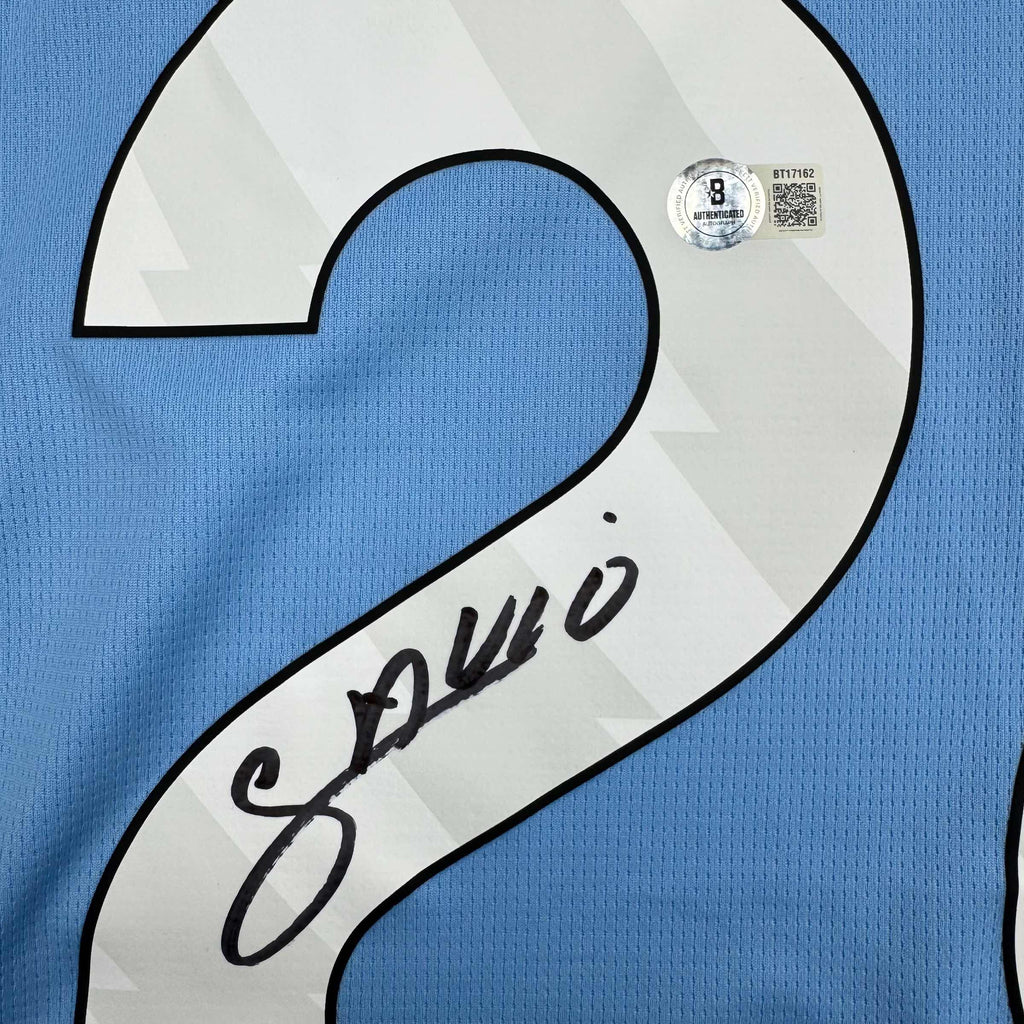 autographed-signed-savinho-manchester-city-blue-soccer-futbol-jersey-beckett-bas-coa