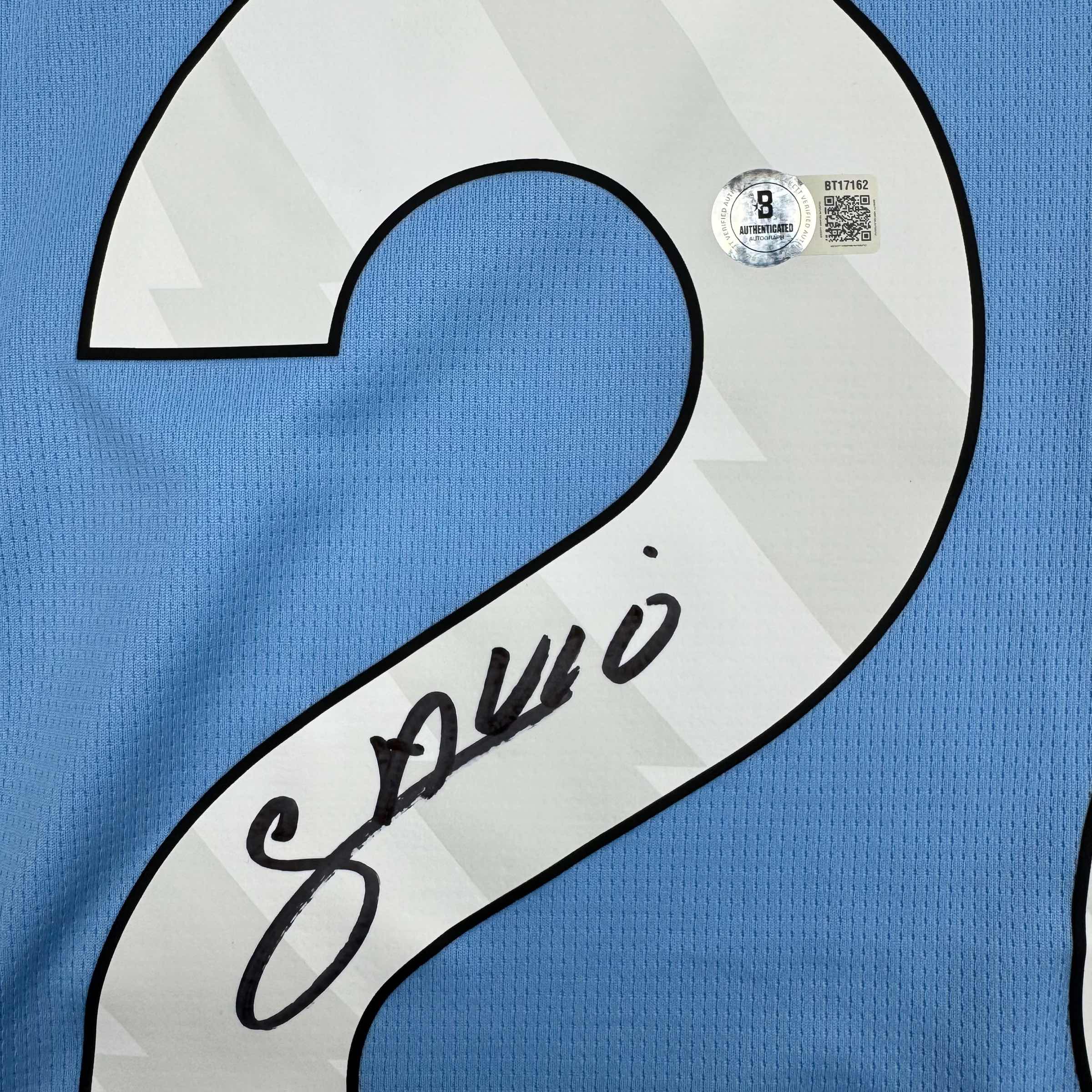 autographed-signed-savinho-manchester-city-blue-soccer-futbol-jersey-beckett-bas-coa