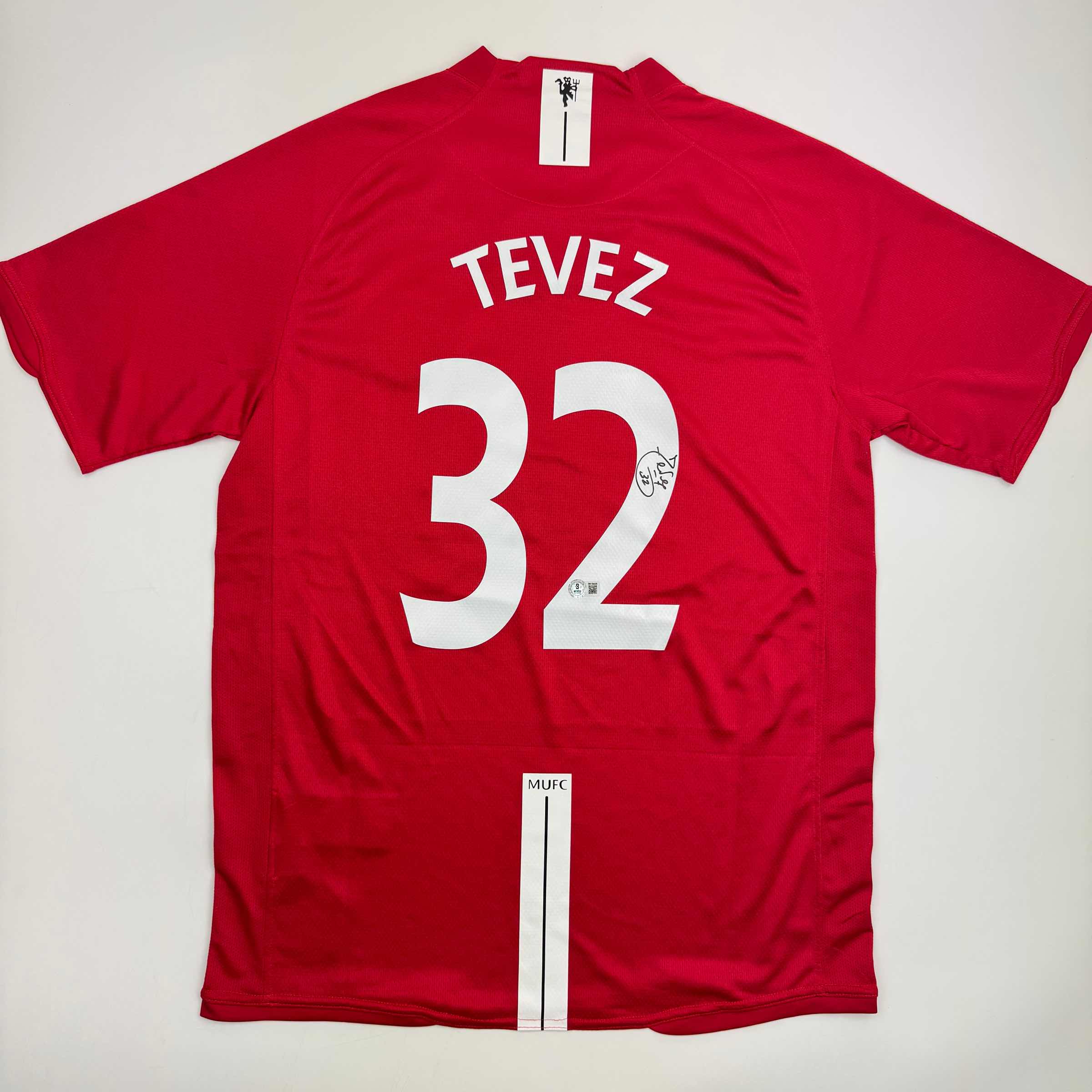 autographed-signed-carlos-tevez-manchester-united-red-soccer-jersey-beckett-bas-coa
