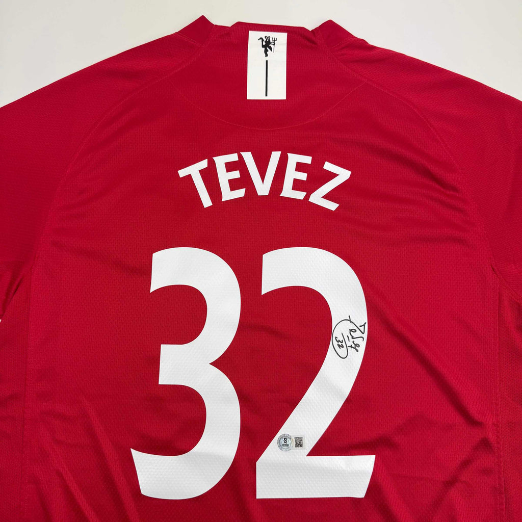 autographed-signed-carlos-tevez-manchester-united-red-soccer-jersey-beckett-bas-coa