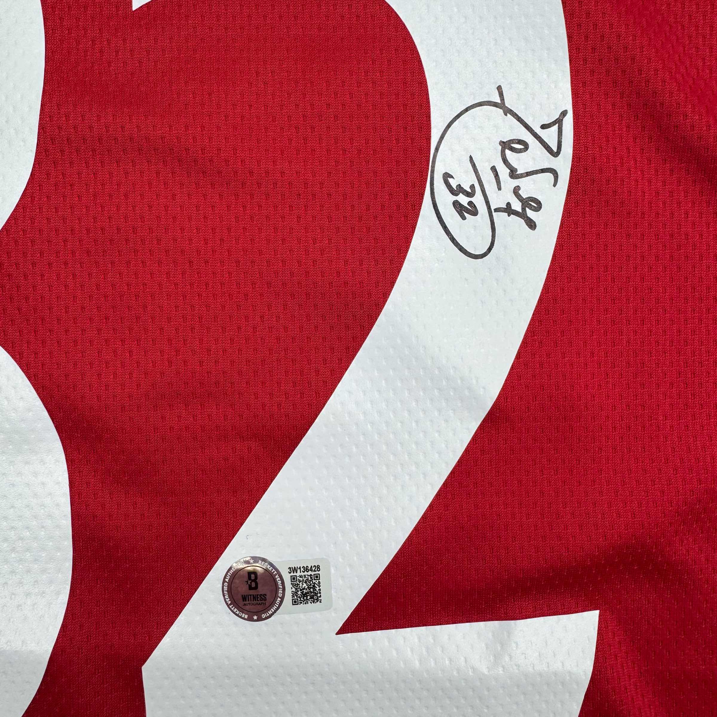 autographed-signed-carlos-tevez-manchester-united-red-soccer-jersey-beckett-bas-coa