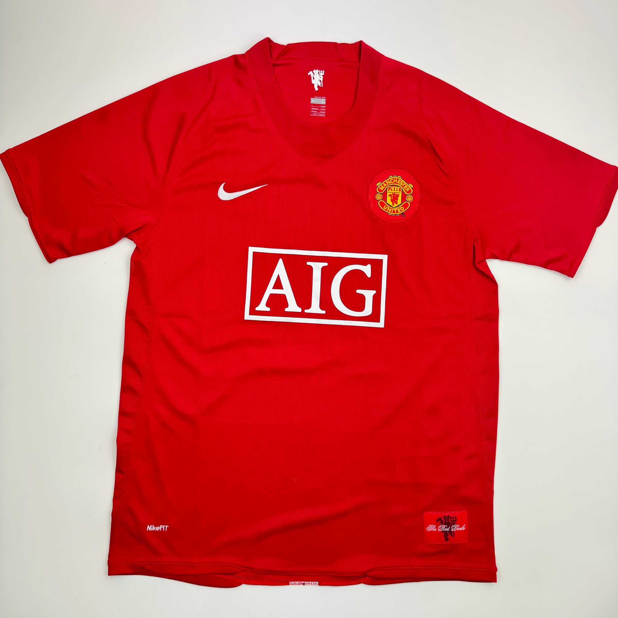 autographed-signed-carlos-tevez-manchester-united-red-soccer-jersey-beckett-bas-coa