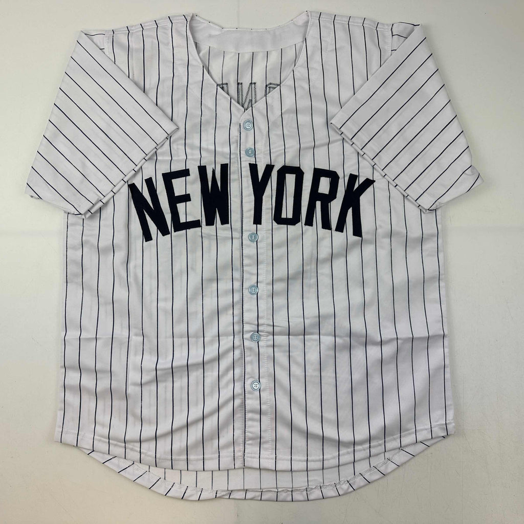 autographed-signed-andruw-jones-new-york-pinstripe-baseball-jersey-jsa-coa