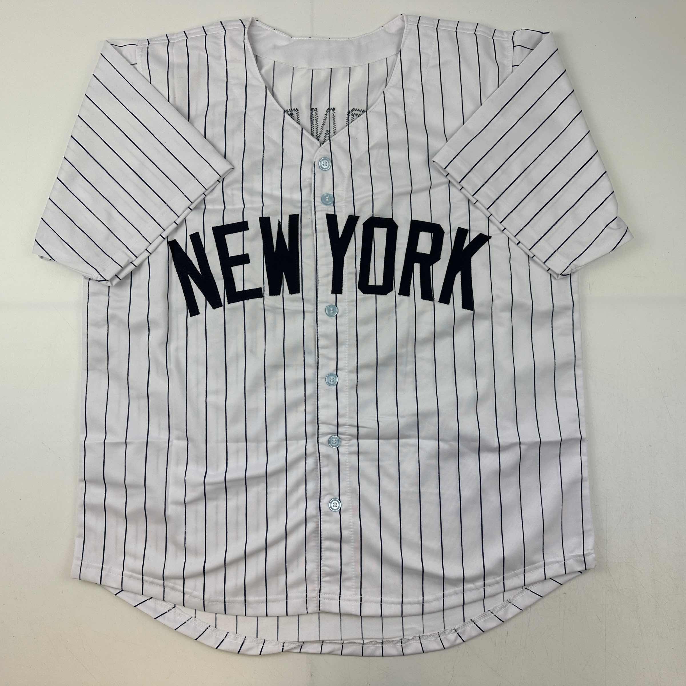 autographed-signed-andruw-jones-new-york-pinstripe-baseball-jersey-jsa-coa