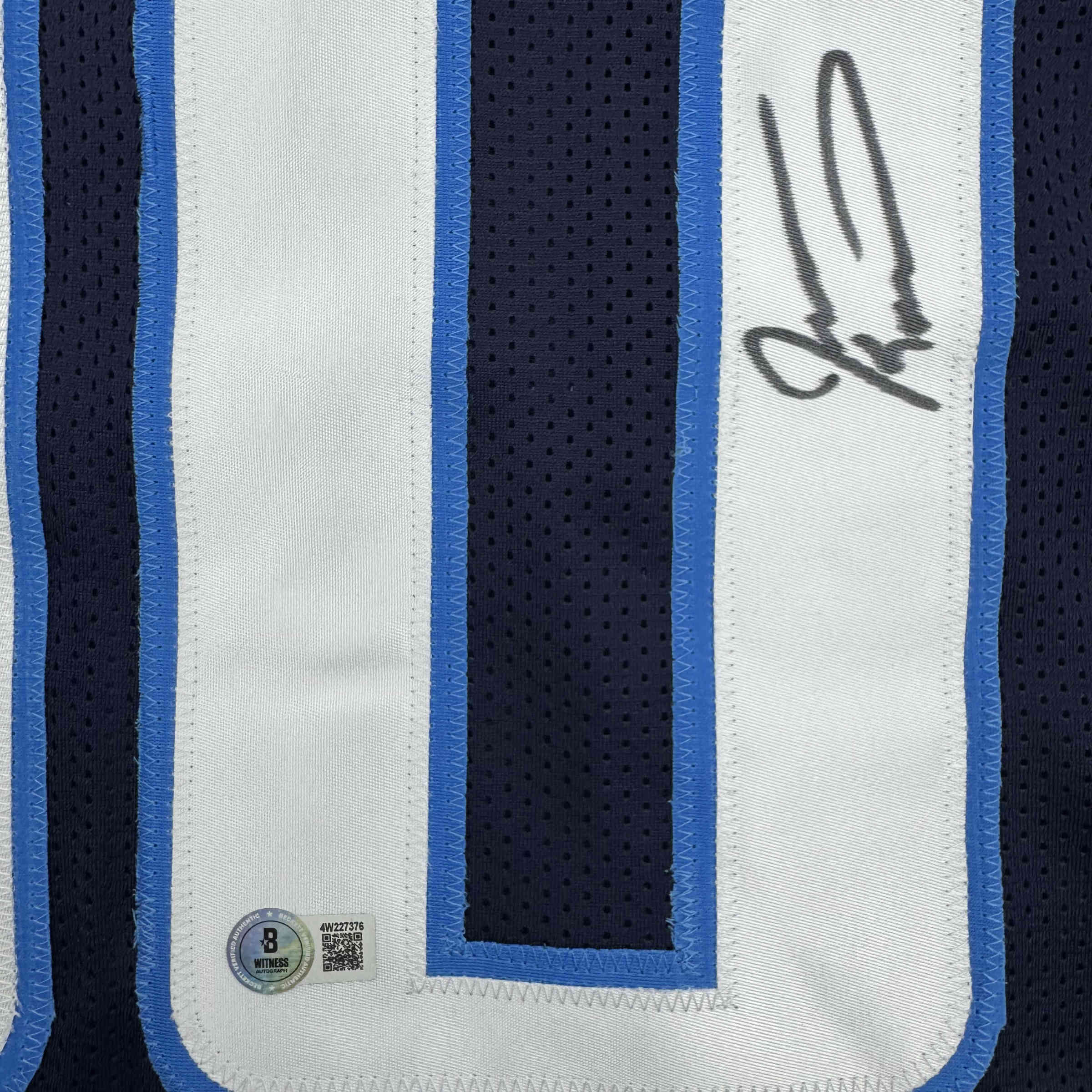 autographed-signed-jevon-kearse-tennessee-dark-blue-football-jersey-jsa-coa