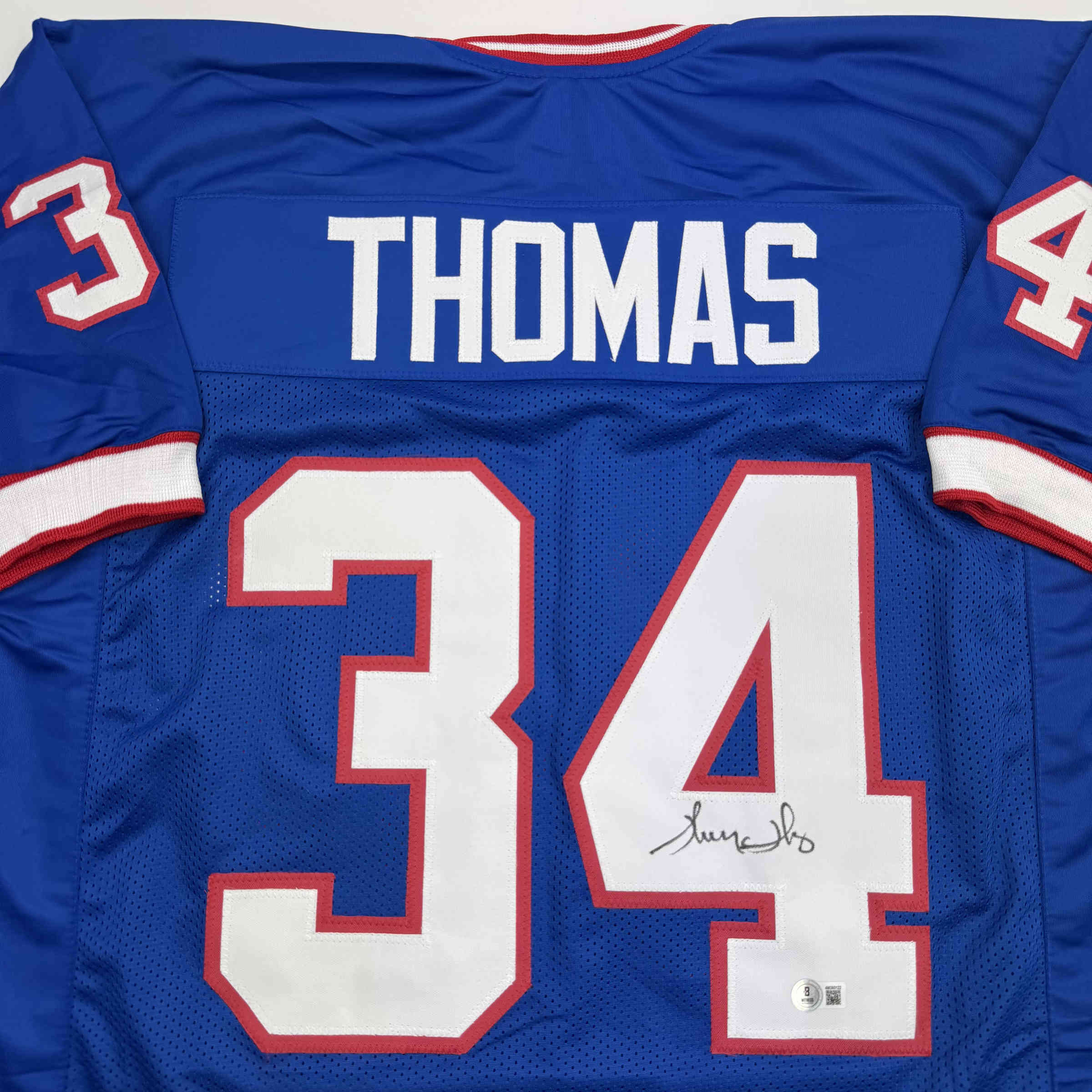 autographed-signed-thurman-thomas-buffalo-blue-football-jersey-jsa-coa