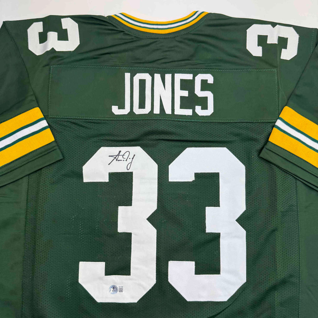 autographed-signed-aaron-jones-green-bay-green-football-jersey-beckett-bas-coa