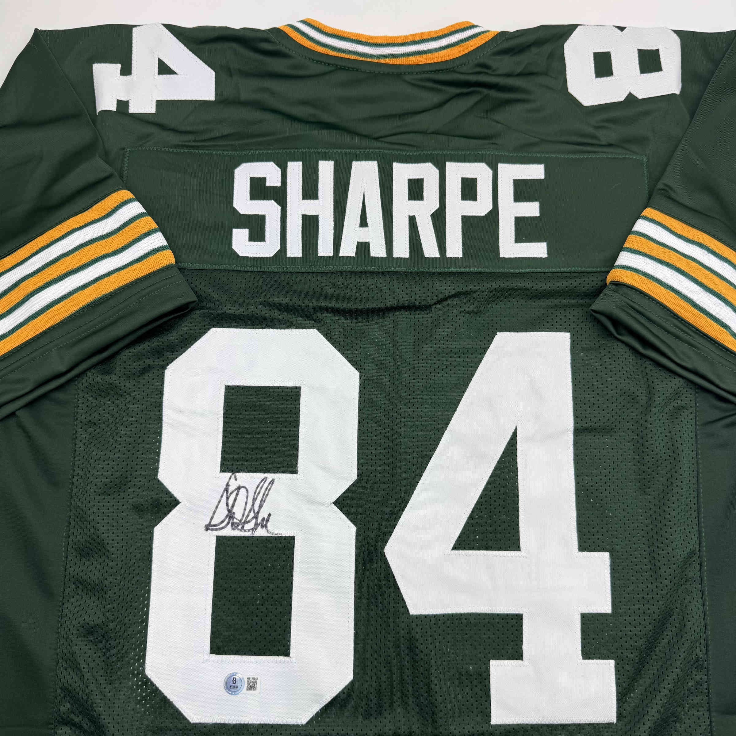autographed-signed-sterling-sharpe-green-bay-green-football-jersey-beckett-bas-coa