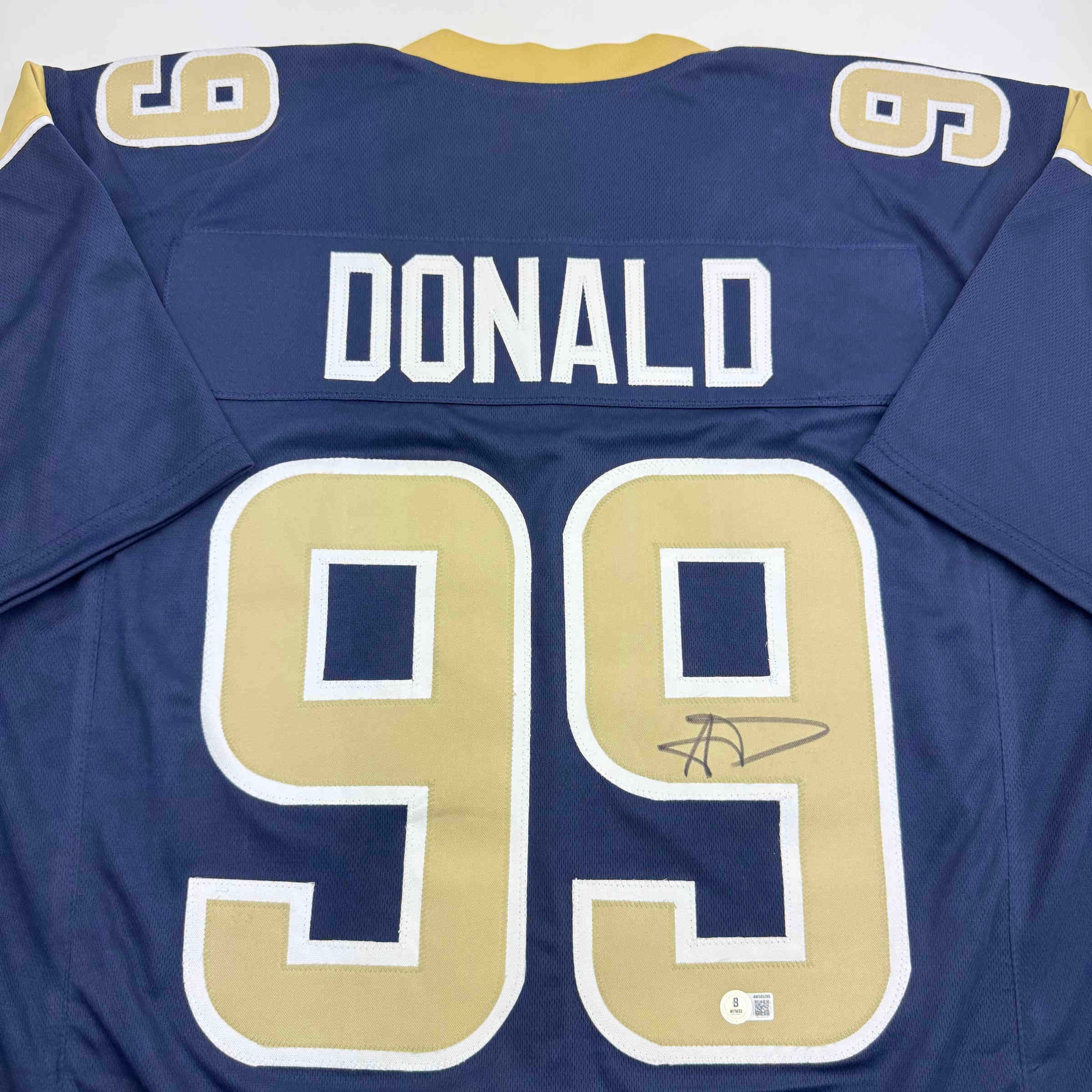 autographed-signed-aaron-donald-los-angeles-la-dark-blue-football-jersey-jsa-coa